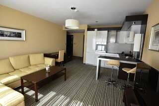 Отель Olives City Hotel София Two-Bedroom Apartment with Hot Tub and Balcony-1